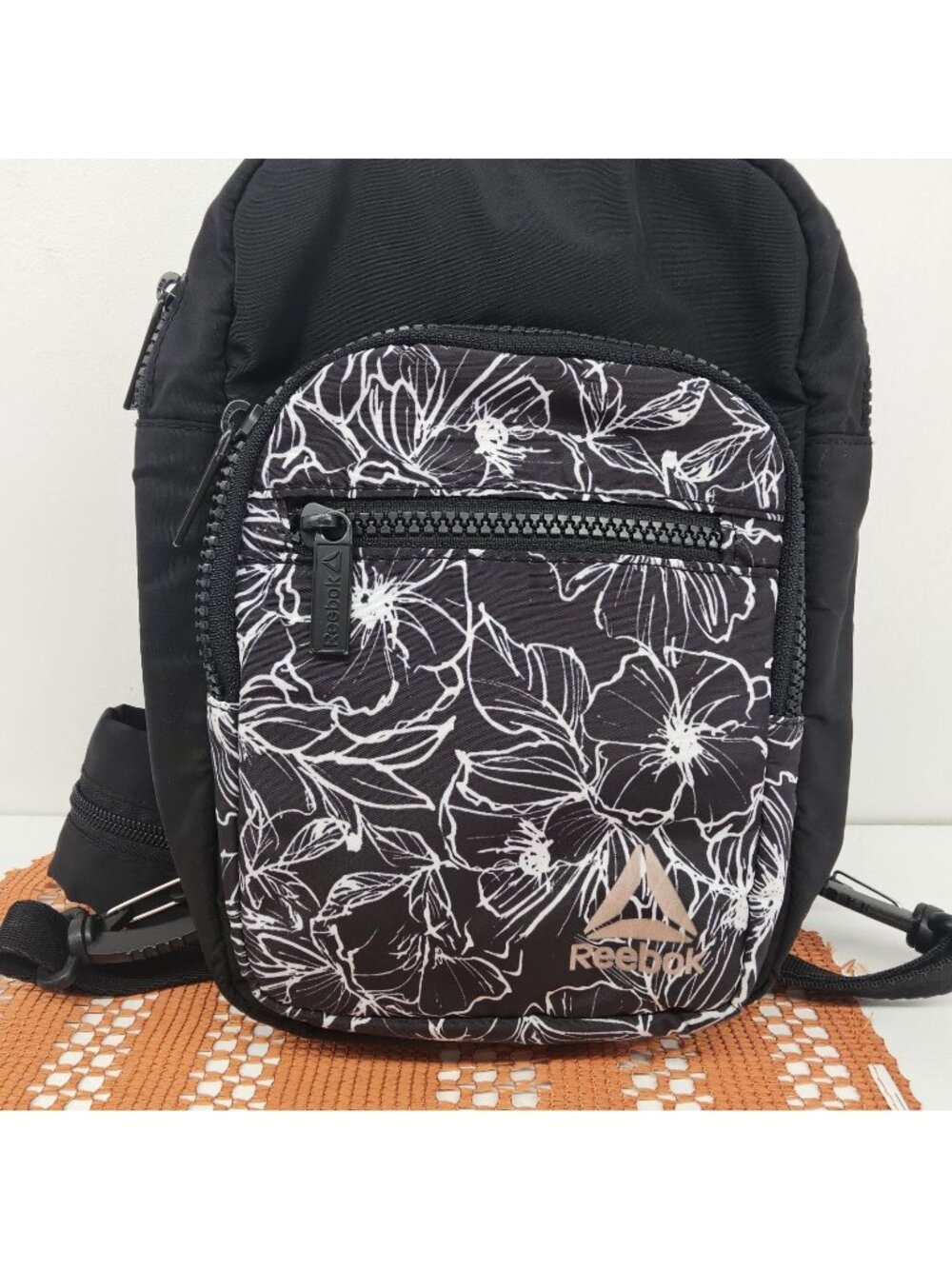 Reebok 2-in-1 Convertible Mini Backpack Sling Bag Black Floral Rose Gold Logo